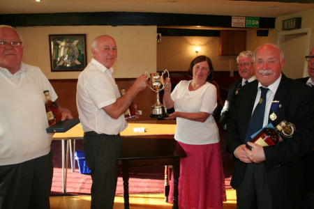 Presentation of cup the skip of winning team